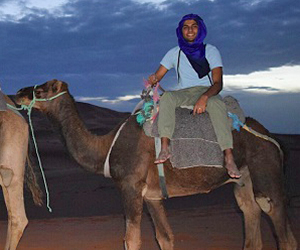 Aaron Bhatt on camel