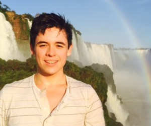 Tristan Marquez in front of waterfall